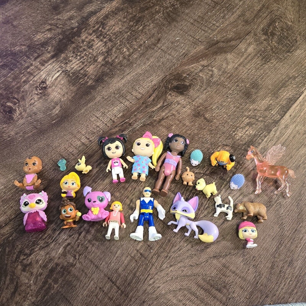 Junk Drawer Bottom of the Toy Box Assorted Dolls Animals Figures